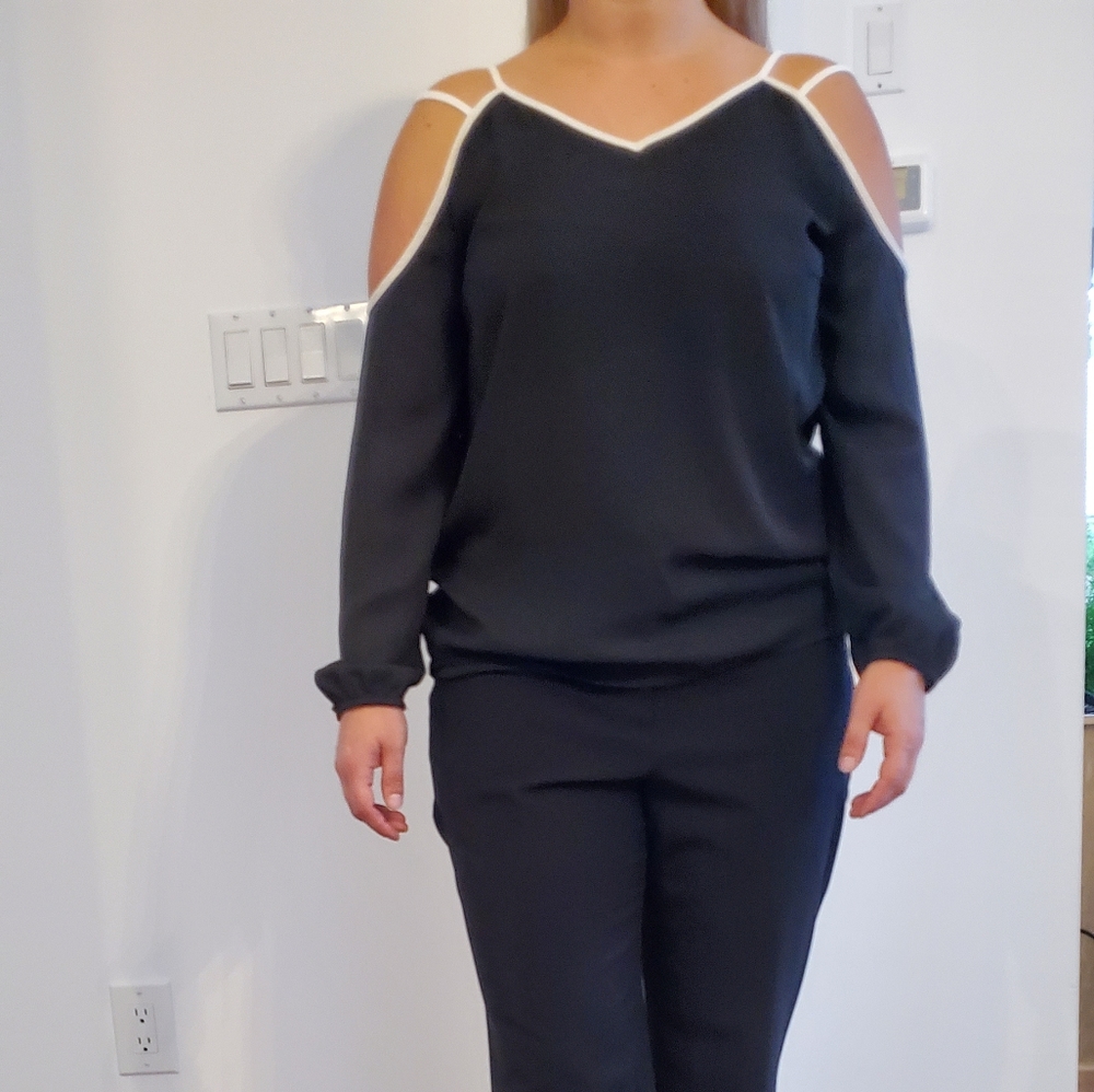 Black 1. State blouse with white trim